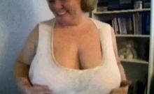 Mature Nancy playing with her boobs on webcam