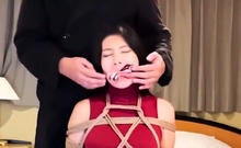 Asian latex bondage